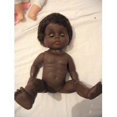 Black 18 inch doll with hair. 