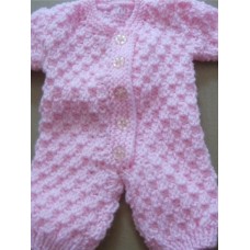 Handknitted textured pink babygro 12inch